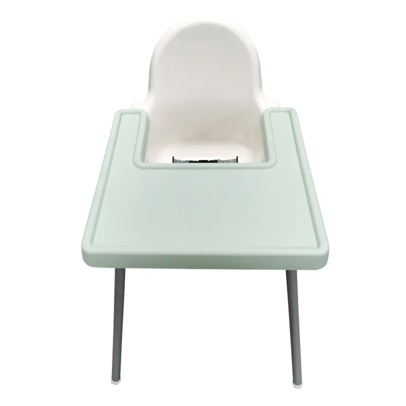 Mint green silicone full cover mat on an IKEA Antilop high chair