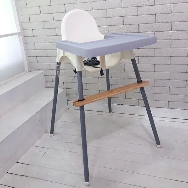 SANNYIN bamboo footrest installed on an IKEA Antilop high chair